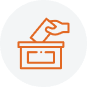 An orange line drawing of a hand placing a paper into a ballot box, with a light gray circular background, symbolizes Public Service in Boundary County ID. | Boundary County ID